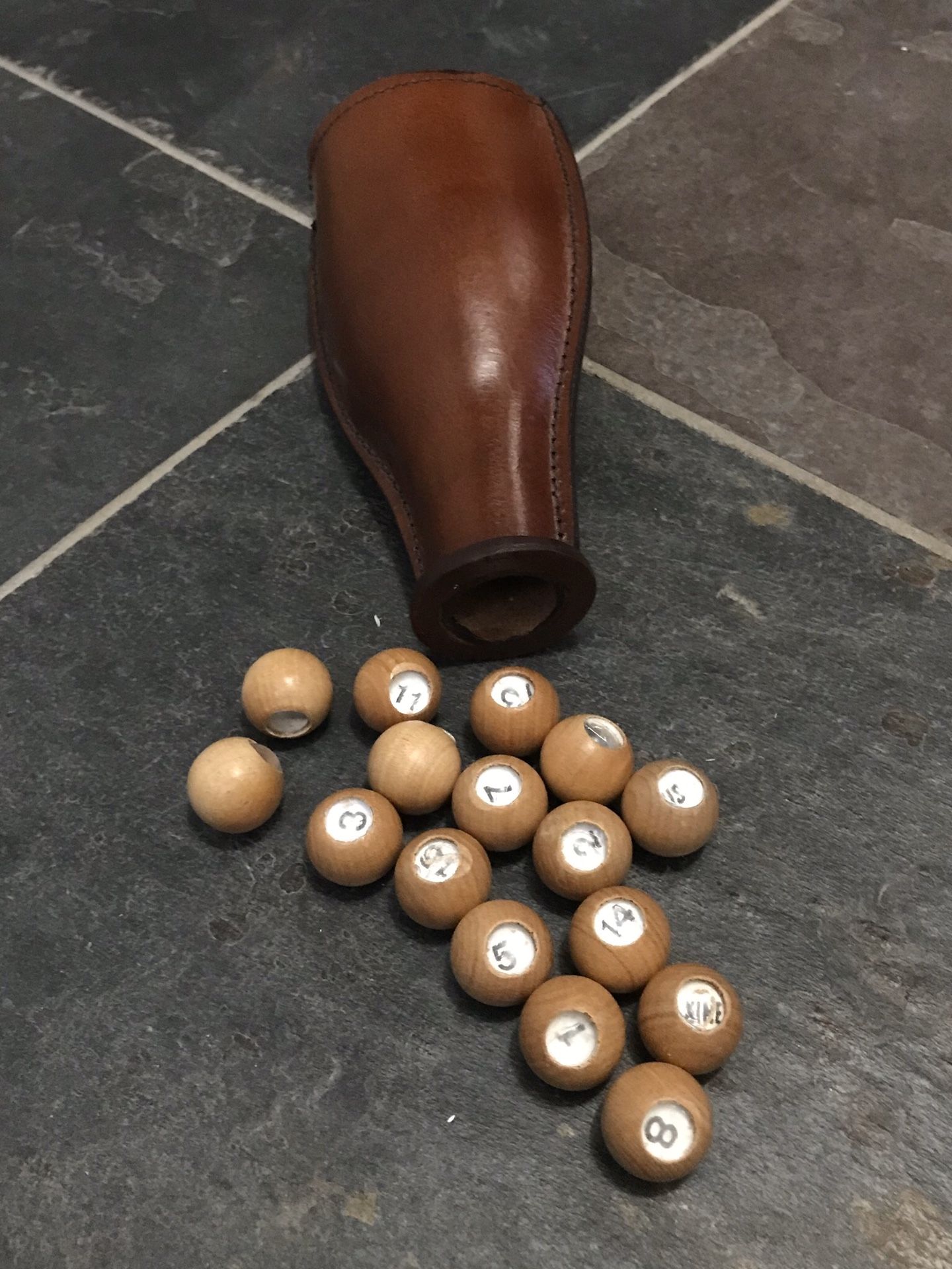 Deluxe Kelly Pool with Leather Shaker Bottle and 16 Wooden Tally Balls/Peas. Kelly Pool is also known as Bottle Pool or Pea Pool.