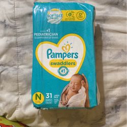 PAMPERS SWADDLERS  SIZE NEWBORN 