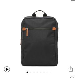 Brand New Black Backpack with brown leather details, front zipper pocket and side pocket. Unopened, sealed package