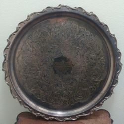 Vintage Webster Wilcox silverplate tray with ornate engraved design.