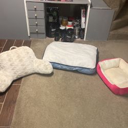 Two Dog Beds And A Back Pillow 