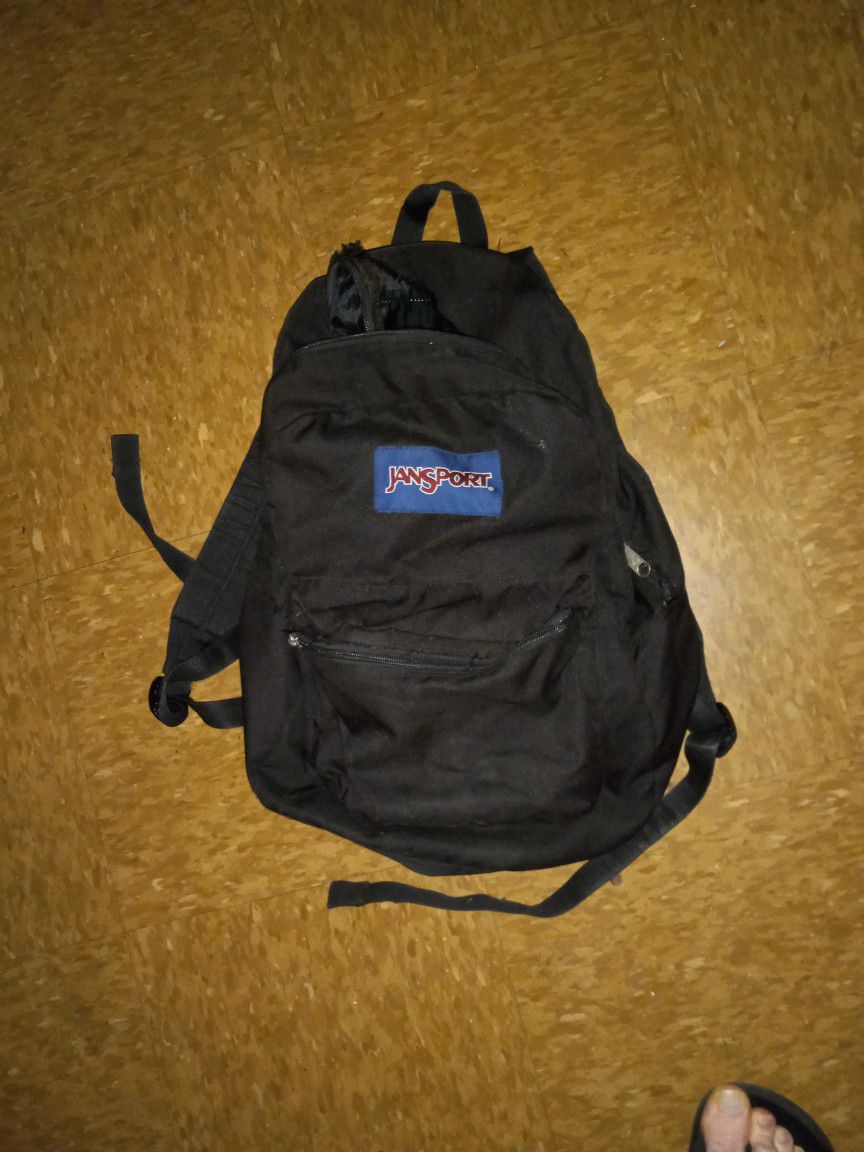Ripped Jansport Backpack 
