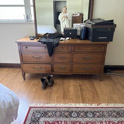 Antique bed, two nightstands, dresser with mirror