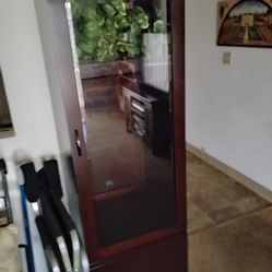 Solid wood display cabinet.