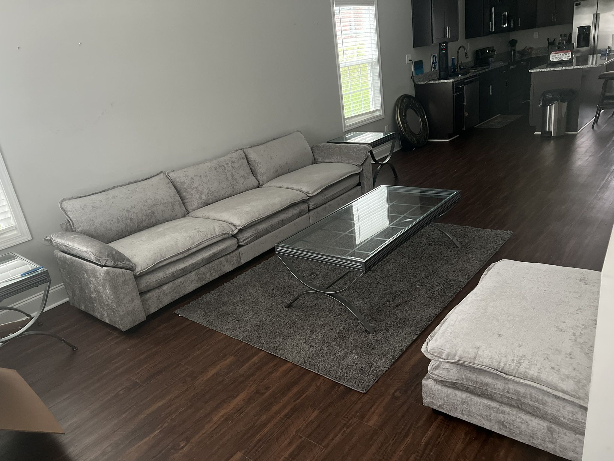 brand new couch, coffee tables, and led fireplace