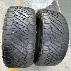 Set Of 2 Nice NITTO RIDGEGRAPPLER 285/45/22 ( We Install & Balance)
