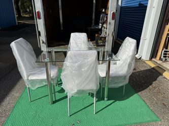 New Rooms to Go Rectangular Glass Top White Dinette Set( One Chair Has Small Hole -Price Reflects One Chair Free)