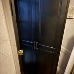 Black Metal Armoire With Shelves And Hanging Rod
