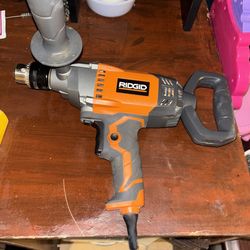 Gas powered post hole digger