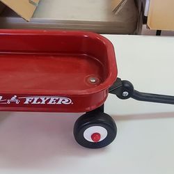 Doll red flyer wagon