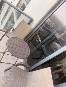 Outdoor dining chairs and tables