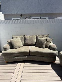 Best offer goes- Deep cushioned couch and loveseat