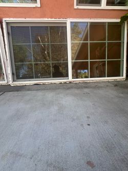 Window including blinds