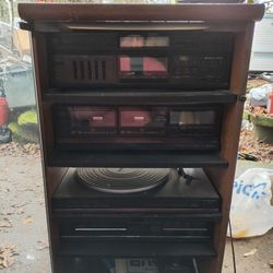 Stereo System With CD, Tape, Album And Receiver 