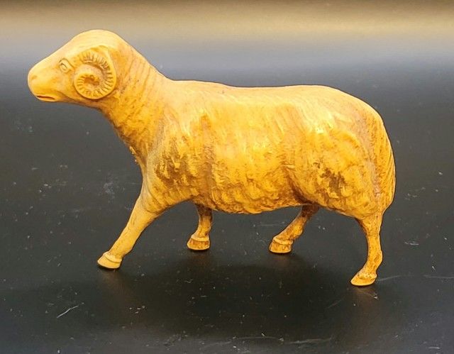 Miniature Bighorn Sheep Celluloid Figurine 1.5" Tall 2" Long Add a touch of the wild to your collection with this miniature Bighorn Sheep figurine.