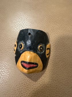 Mini hand painted monkey mask with a whole for string to to hang
