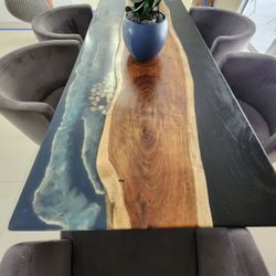 Wooden table with resin.
