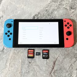 Nintendo Switch Tablet with Joycons & 2 Games