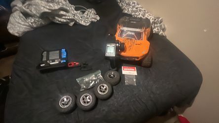 Arrma RC Truck with Controller and Extra Wheels