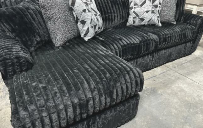 Black Sectional with Chaise and Pillows