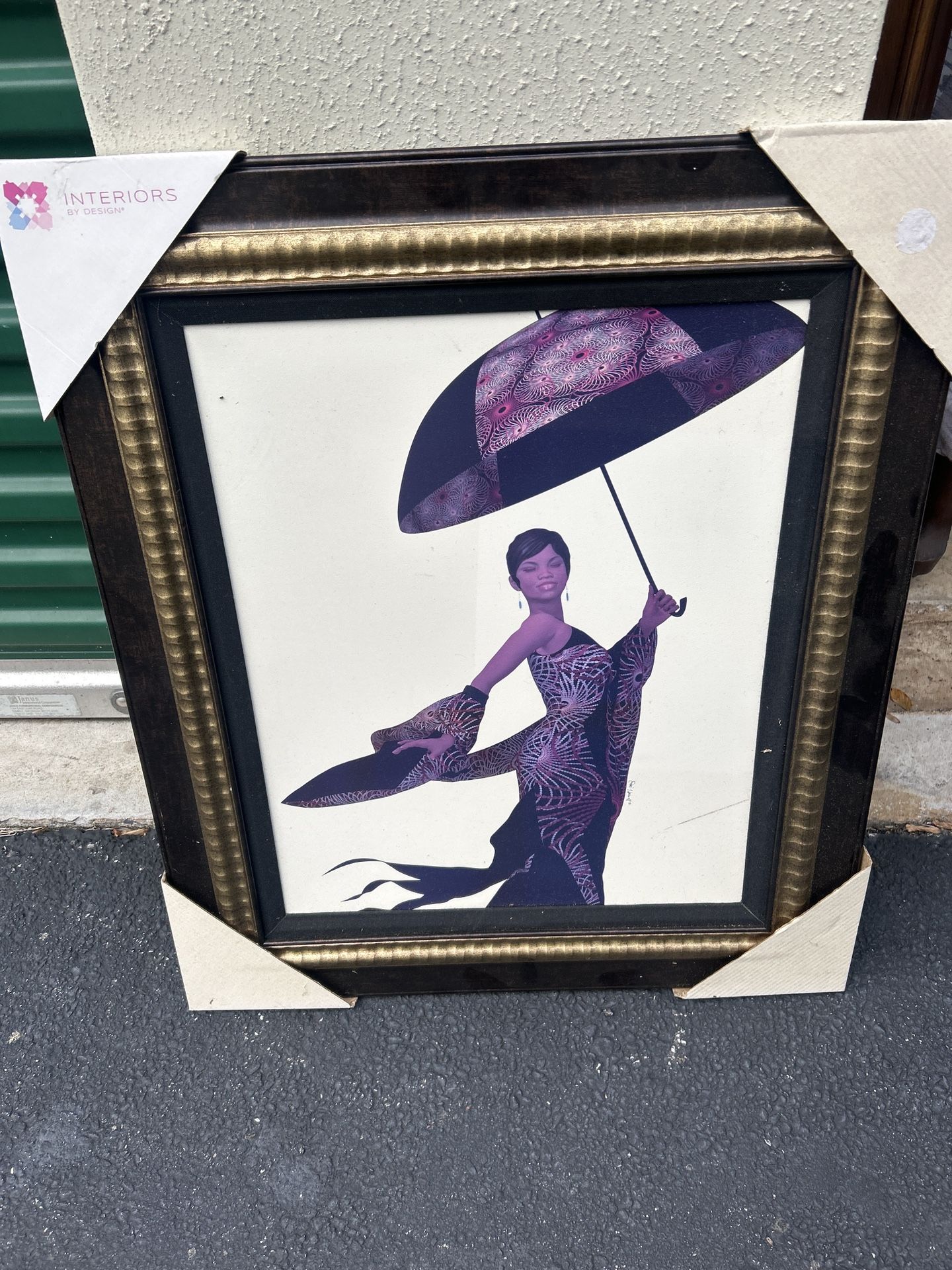 Interiors by Design Framed Art — “Lady with Umbrella” (24 × 24 in.) — Pickup in Riverdale