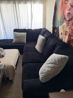 Black corduroy couch with chaise