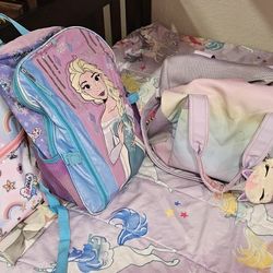 Girl Backs And Duffle Bag