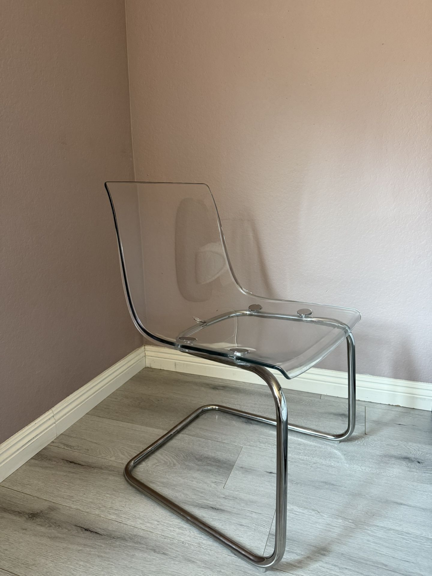 “Tobias” clear IKEA chair 