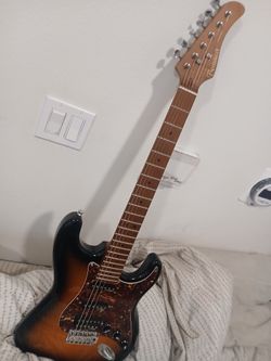 Benssica Super STRAT w Roasted Maple Neck....Full Wilkinson Hdwr...in Mint Condition  $300