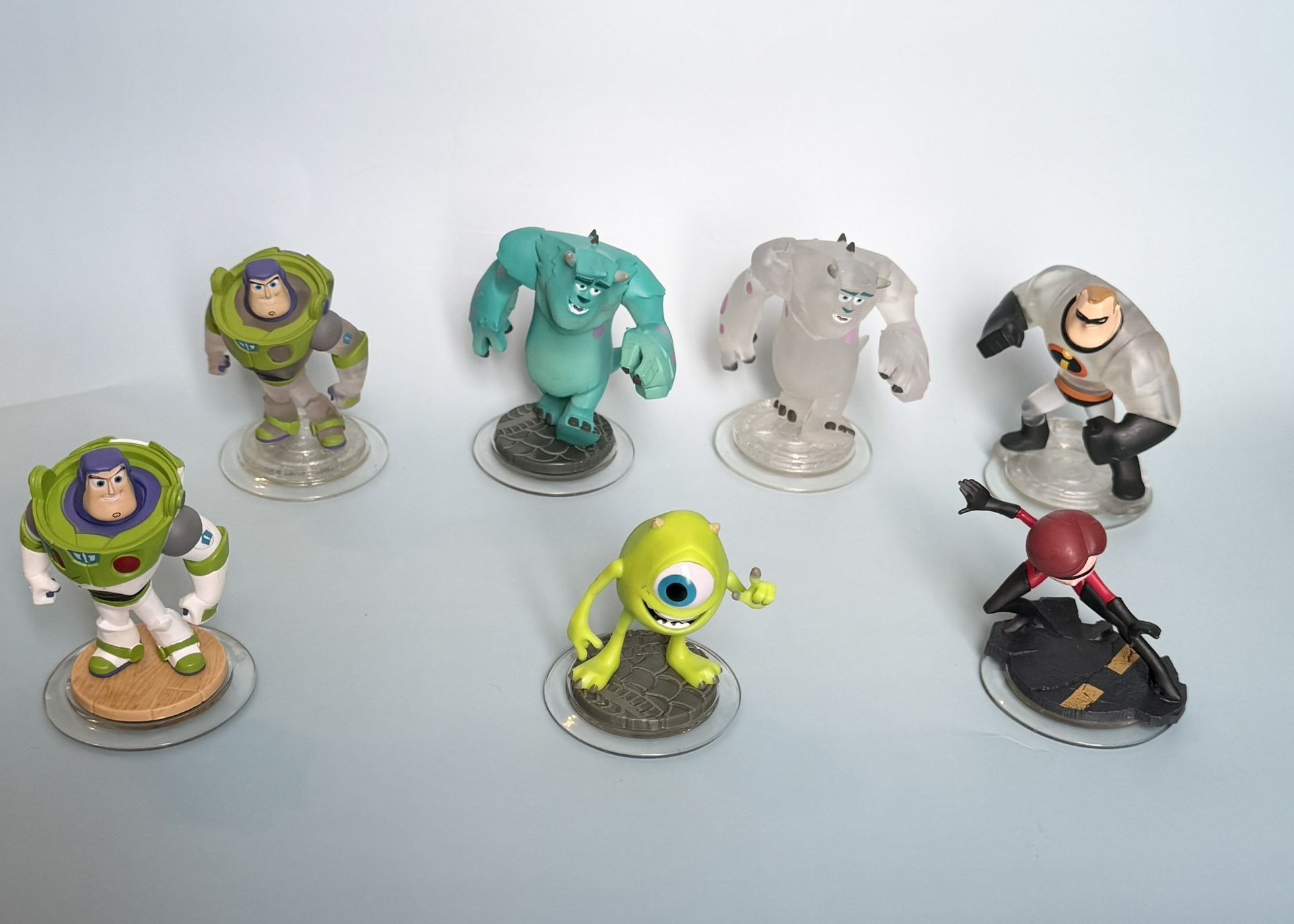 Disney Infinity The Incredibles /Monster Inc / Buzz Lightyear Figures. Set of 7.