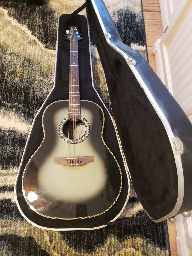 Ovation Celebraty 11-B model number with hard shell case