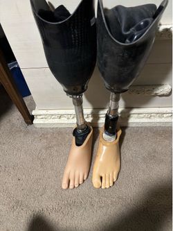 Two below knee prosthetic legs