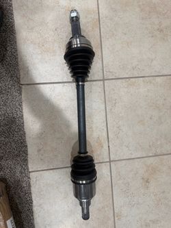 , GSP ncv53017 front driver side axle assembly
