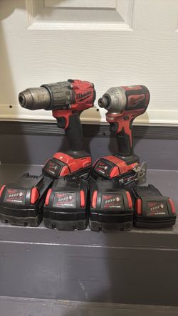 Milwaukee drill and impact set with 6 batteries