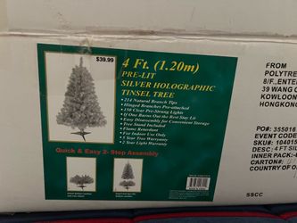 4 foot pre-lit silver tinsel tree