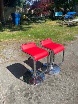 Nice 2 red leather bar stools