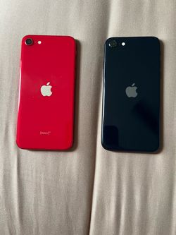 Two iPhones red is 2nd gen and black is 3rd gen