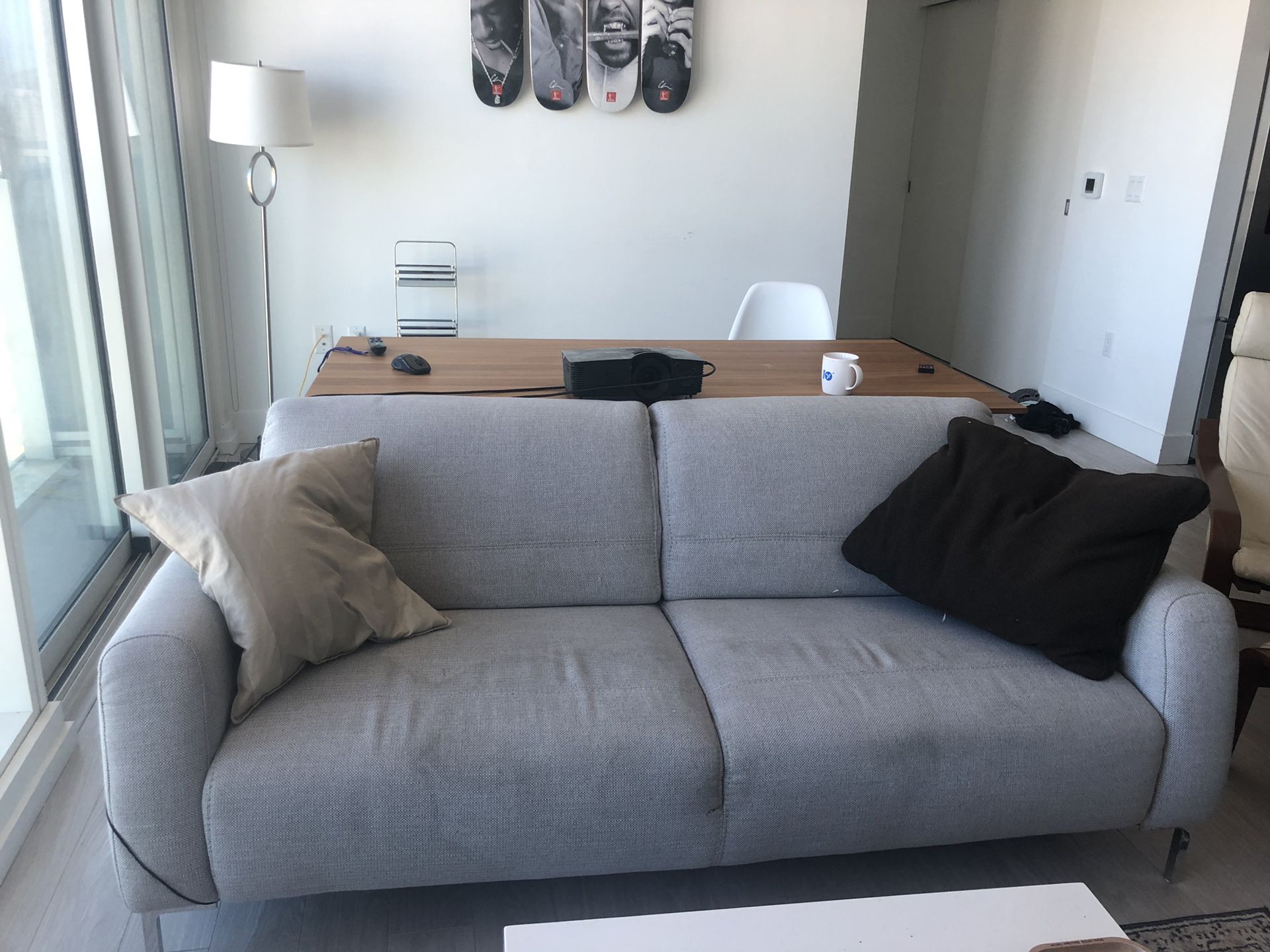 Contemporary gray couch with chrome legs