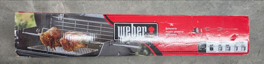 Weber Rotisserie and Rotisserie Skewer Set brand new.