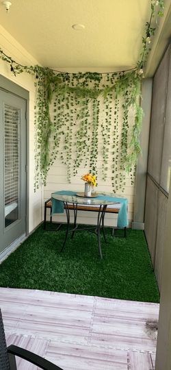 Balcony Bistro Set (table, bench, turf, lights, plants)