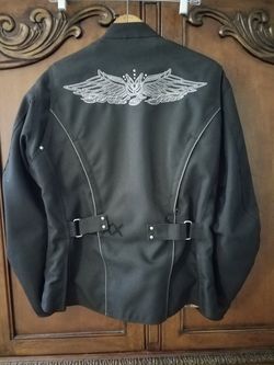 Womens Street and Steel Motorcycle jacket size large. Like new.