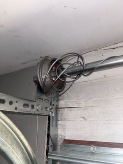 Garage door spring and opener