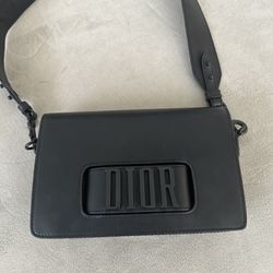 Dior handbag with matte finish leather.