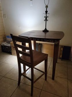 Retro bar heght table solid wood heavy.and one chair. 75.00