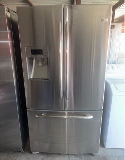 GE Stainless Steel Refrigerator And Freezer