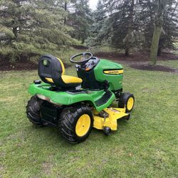 John Deere Riding Lawn Mower With A 54 In Deck And 25HP Kawasaki Engine 