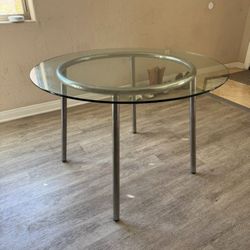 Glass top dining table