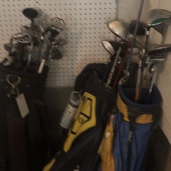 Golf Cubs And New And Old Balls