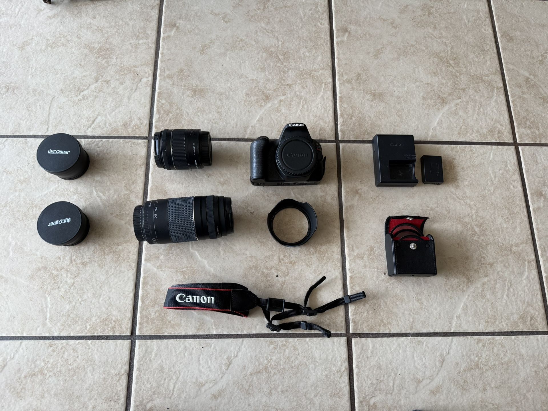 Canon SL2 DSLR Camera + extra