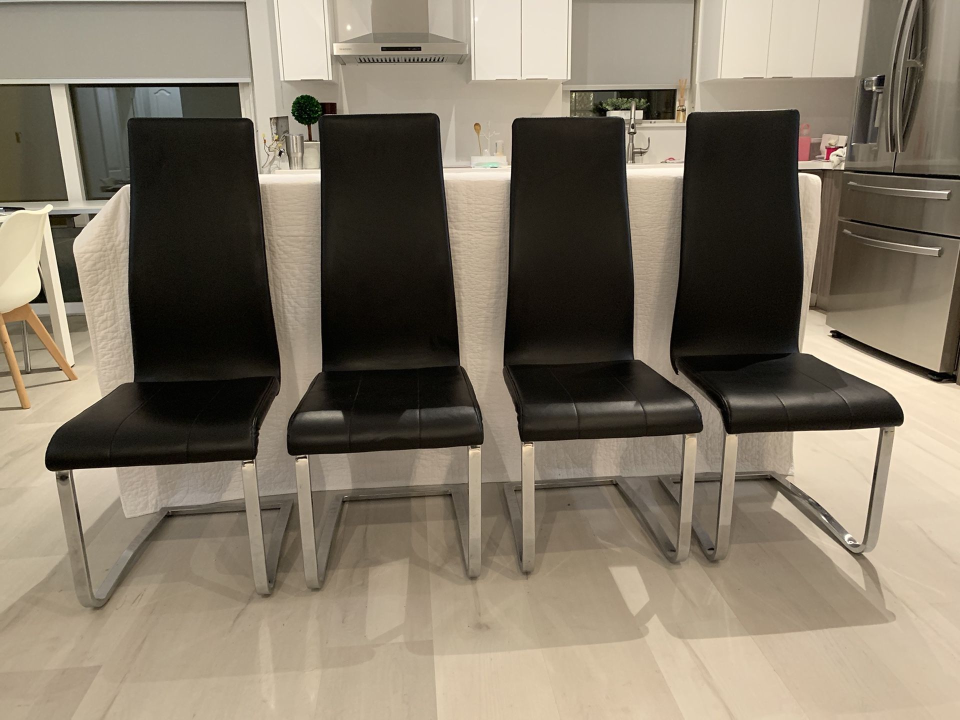 Black leather chairs (4)